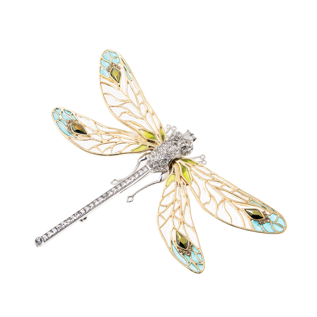 Make a statement with this show-stopping dragonfly brooch. This brooch features genuine Swarovski crystals, hand-painted enamel on the wing tips and a gold-plated base. This is truly costume jewelry at its finest. Gold Plated with Hand Painted Enamel & Swarovski Crystals Measurements: Width 4.3" x Length 2.75".