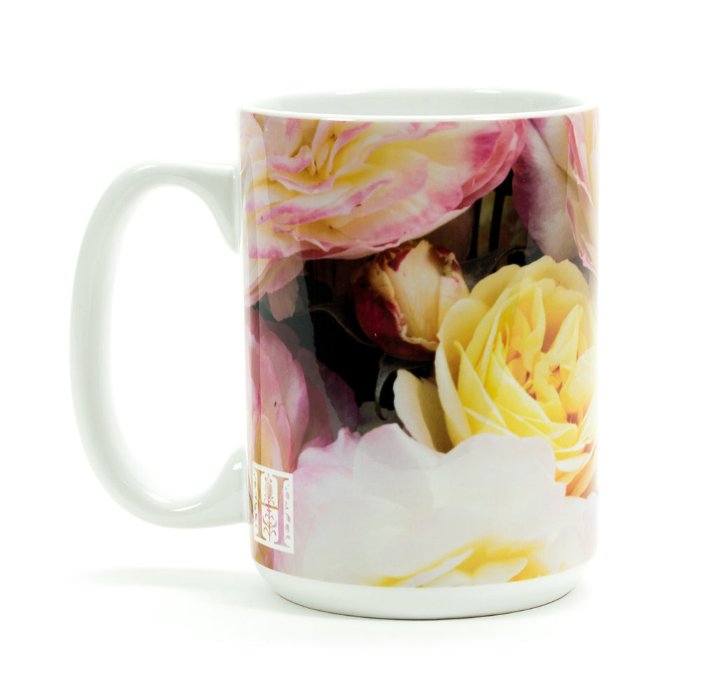 Ceramic mug featuring the 'Huntington's 100th' rose. In celebration of the centennial of The Huntington, this rose is a spectacle of pastel yellow with a kiss of pink and cream. Hybridized by Tom Carruth, The Huntington's Curator of the Rose Collections. Exclusive to the Huntington Store Size: 4.5" tall. 3.5".