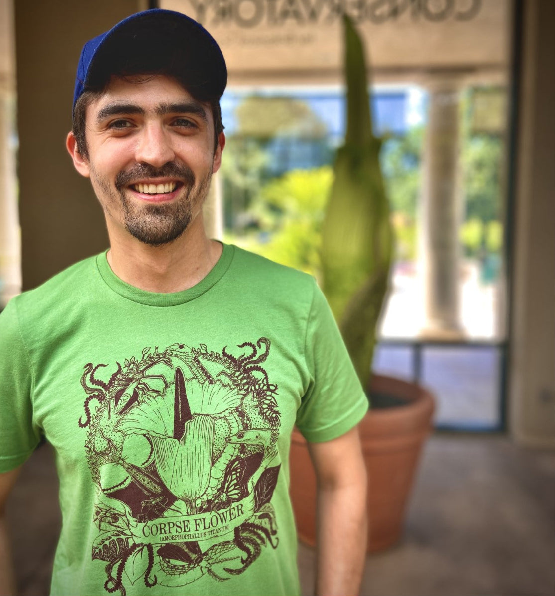 Designed by UK artist, Candy Joyce, this graphic tee celebrates the Corpse Flower blooms at The Huntington. Unisex. 100% cotton. Leaf green colored t-shirt with plum ink imprint.