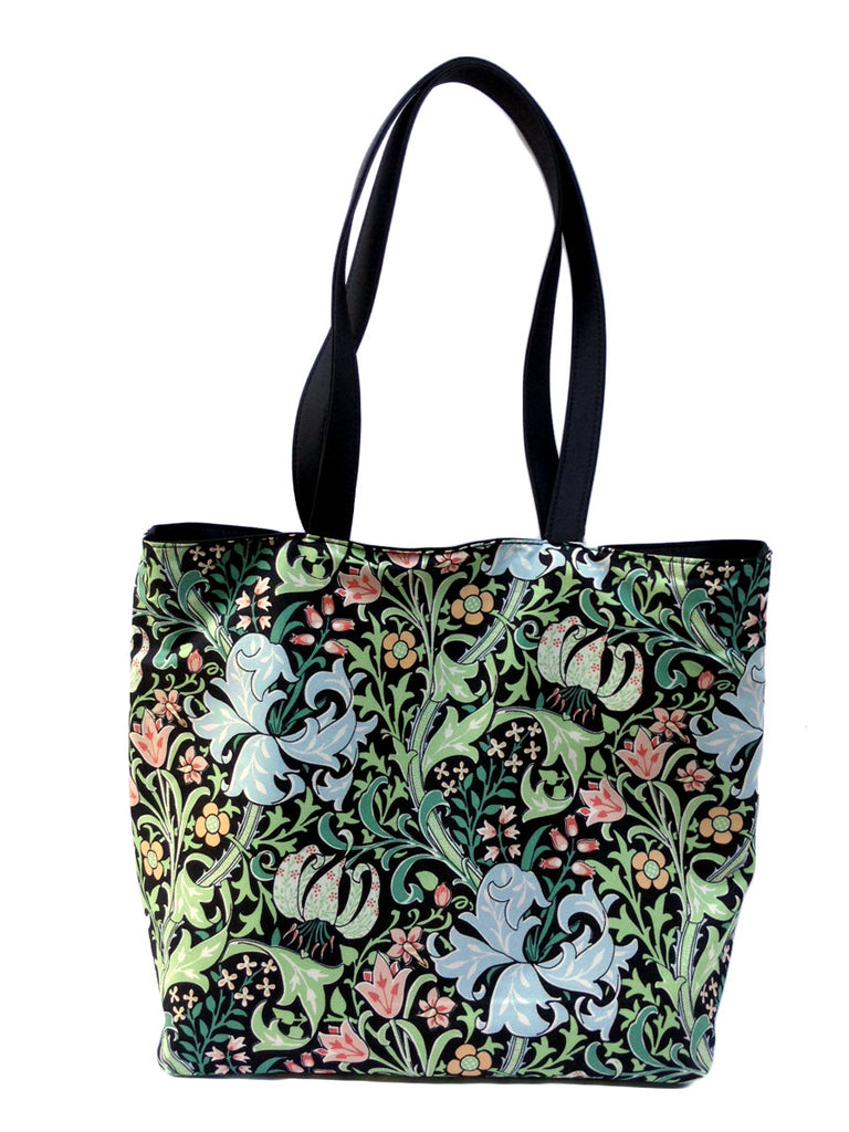 A lightweight beautifully designed museum tote custom made for The Huntington based on William Morris's Golden Lily, held in The Huntington's Art Collections. Practical and elegant, this fully reversible tote can be worn print-side out, or print side in. 13 x 15 x 5 inches.